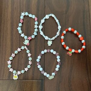 RILAKKUMA SET OF FIVE STRETCH BRACELETS NEVER WORN NO PACKAGING